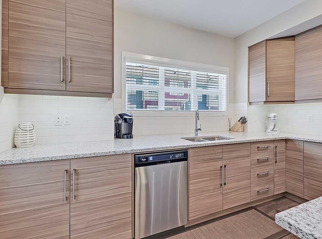 117 Nolancrest Common Nw, Calgary, AB - Indoor Photo Showing Kitchen With Double Sink