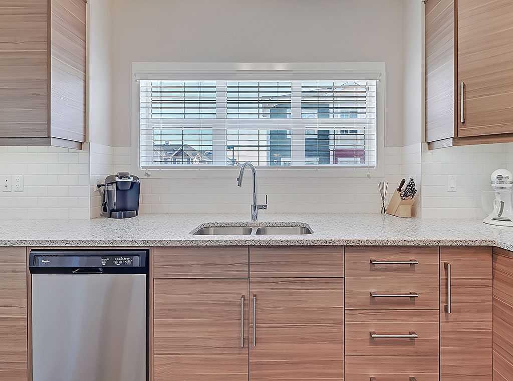 117 Nolancrest Common Nw, Calgary, AB - Indoor Photo Showing Kitchen With Double Sink