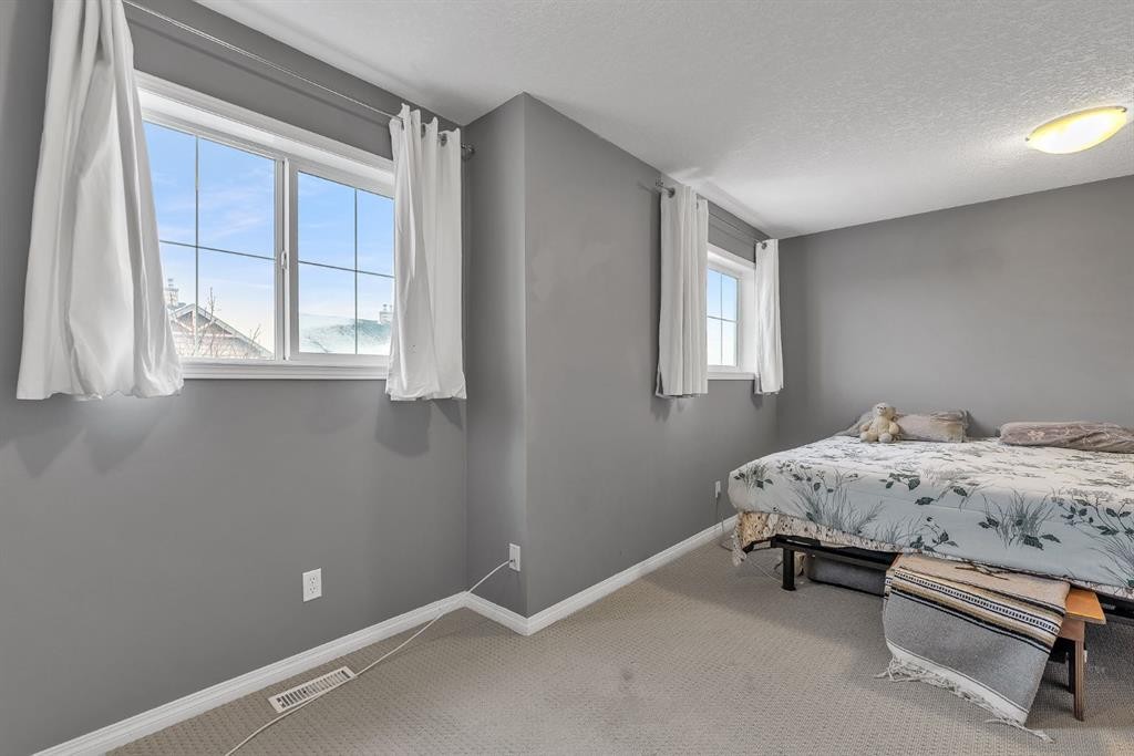 106 Ranch Ridge Meadow, Strathmore, AB - Indoor Photo Showing Bedroom