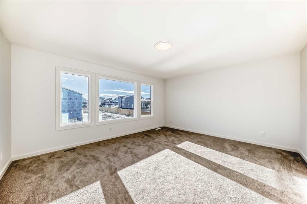 63 Creekside Path Sw, Calgary, AB - Indoor Photo Showing Other Room