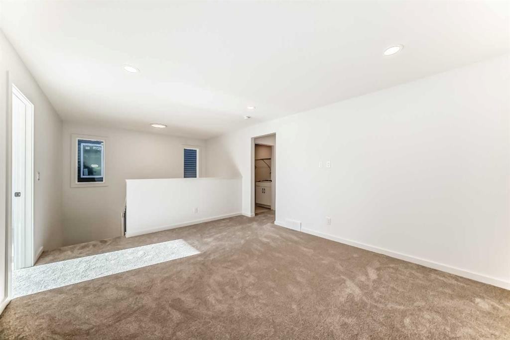 63 Creekside Path Sw, Calgary, AB - Indoor Photo Showing Other Room