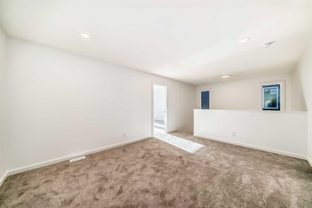 63 Creekside Path Sw, Calgary, AB - Indoor Photo Showing Other Room