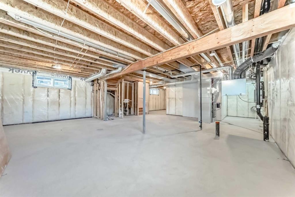 63 Creekside Path Sw, Calgary, AB - Indoor Photo Showing Basement