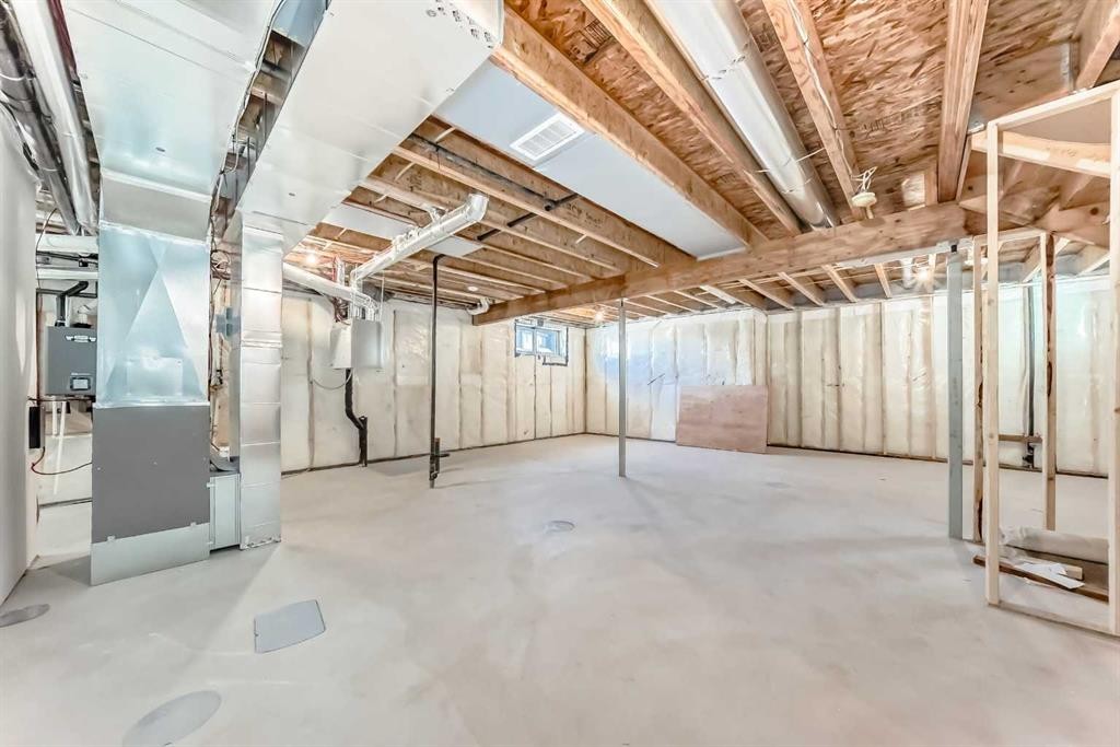 63 Creekside Path Sw, Calgary, AB - Indoor Photo Showing Basement