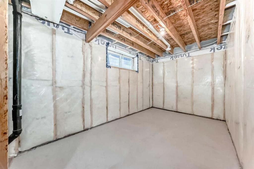 63 Creekside Path Sw, Calgary, AB - Indoor Photo Showing Basement