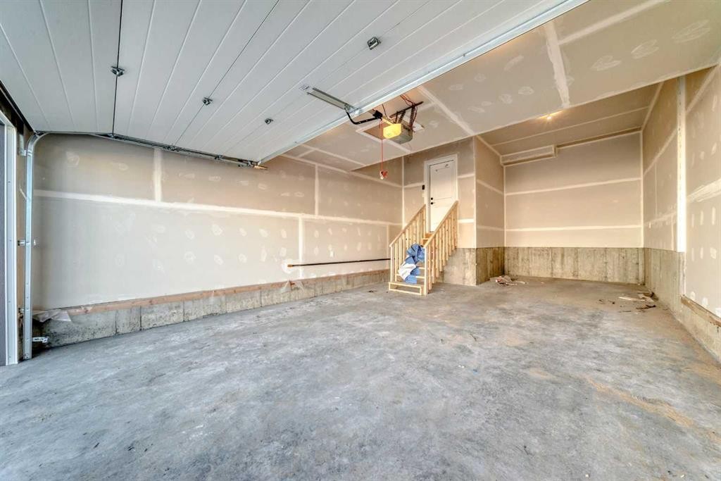 63 Creekside Path Sw, Calgary, AB - Indoor Photo Showing Garage