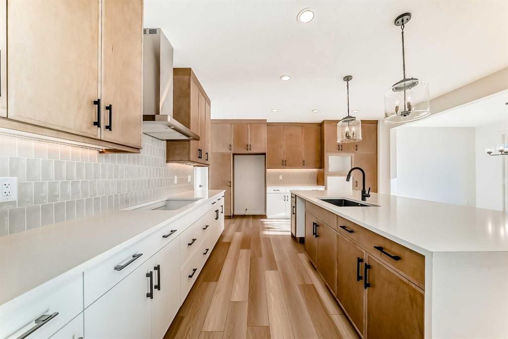 63 Creekside Path Sw, Calgary, AB - Indoor Photo Showing Kitchen With Upgraded Kitchen