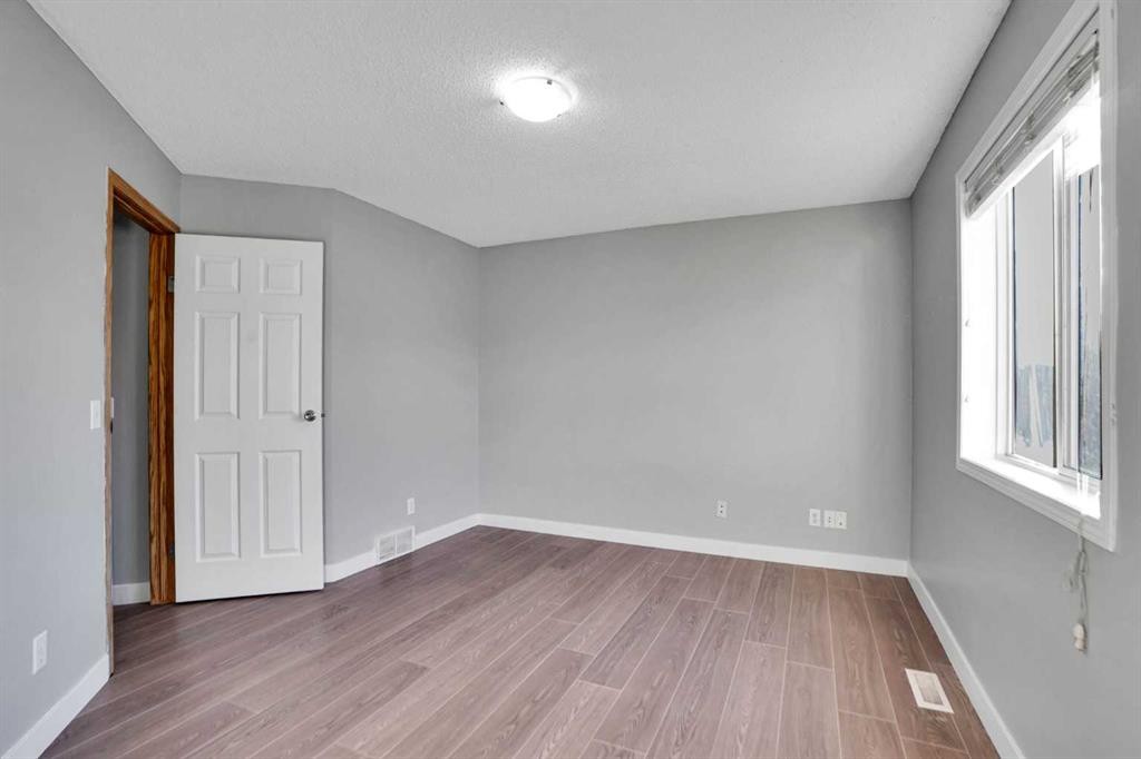 1134 Martindale Boulevard Ne, Calgary, AB - Indoor Photo Showing Other Room
