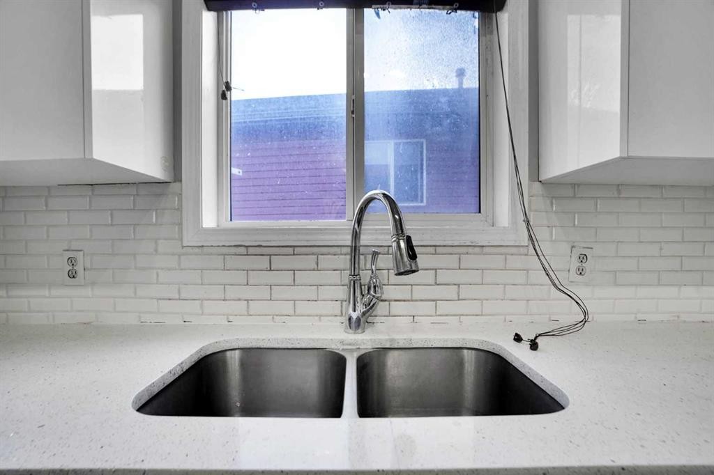 1134 Martindale Boulevard Ne, Calgary, AB - Indoor Photo Showing Kitchen With Double Sink