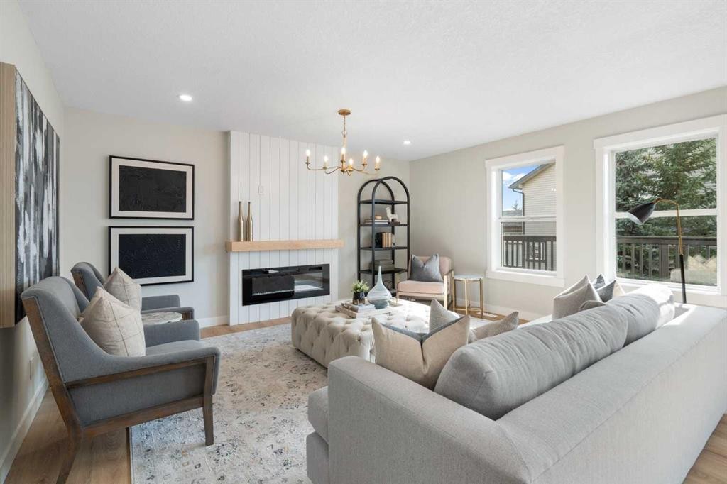 335 Hidden Creek Boulevard Nw, Calgary, AB - Indoor Photo Showing Living Room With Fireplace
