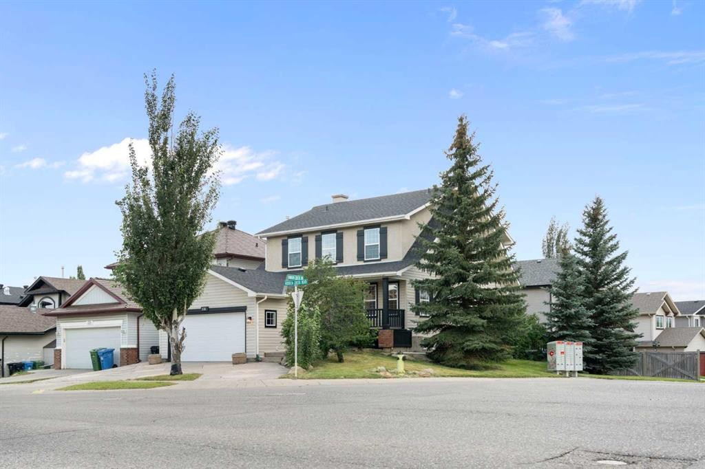 335 Hidden Creek Boulevard Nw, Calgary, AB - Outdoor With Facade