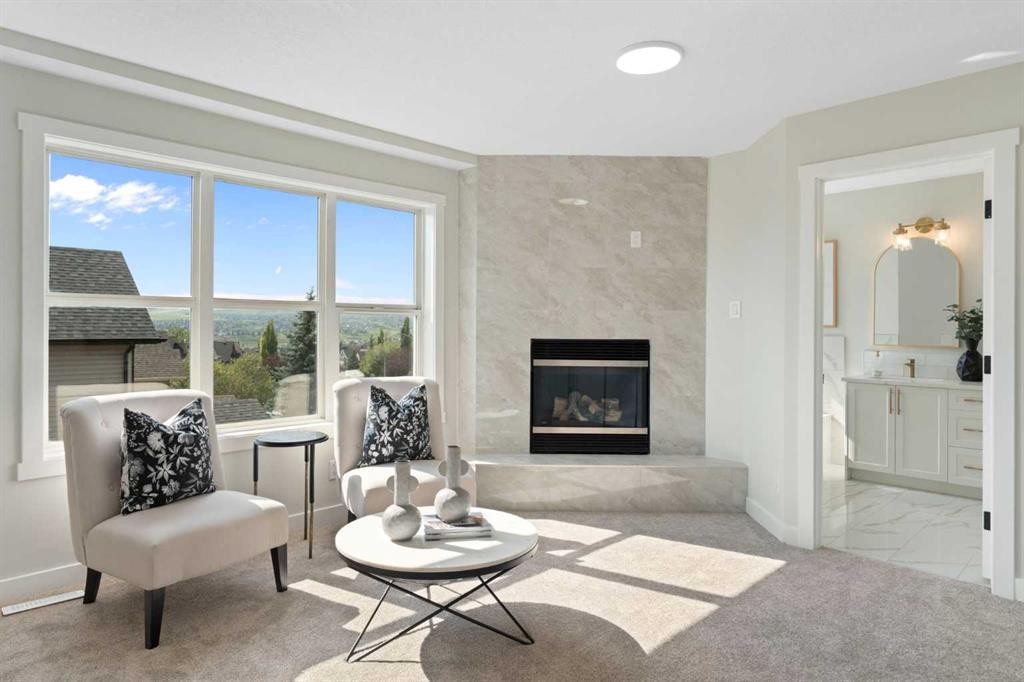 335 Hidden Creek Boulevard Nw, Calgary, AB - Indoor Photo Showing Living Room With Fireplace