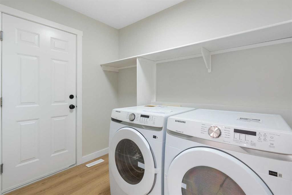 335 Hidden Creek Boulevard Nw, Calgary, AB - Indoor Photo Showing Laundry Room