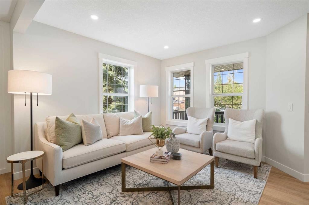 335 Hidden Creek Boulevard Nw, Calgary, AB - Indoor Photo Showing Living Room