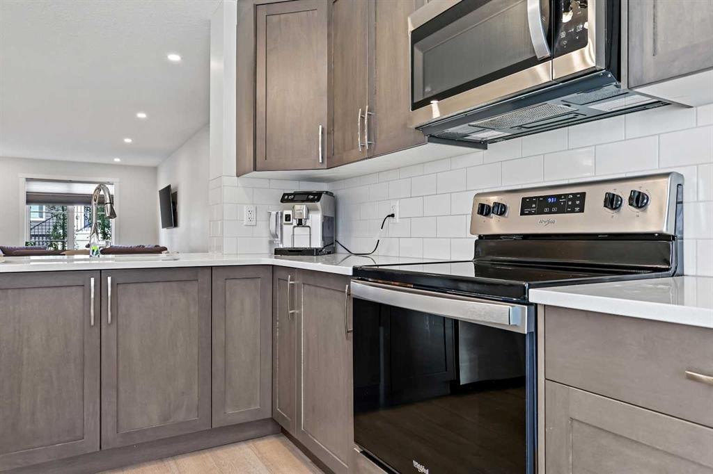 107-474 Seton Circle Se, Calgary, AB - Indoor Photo Showing Kitchen