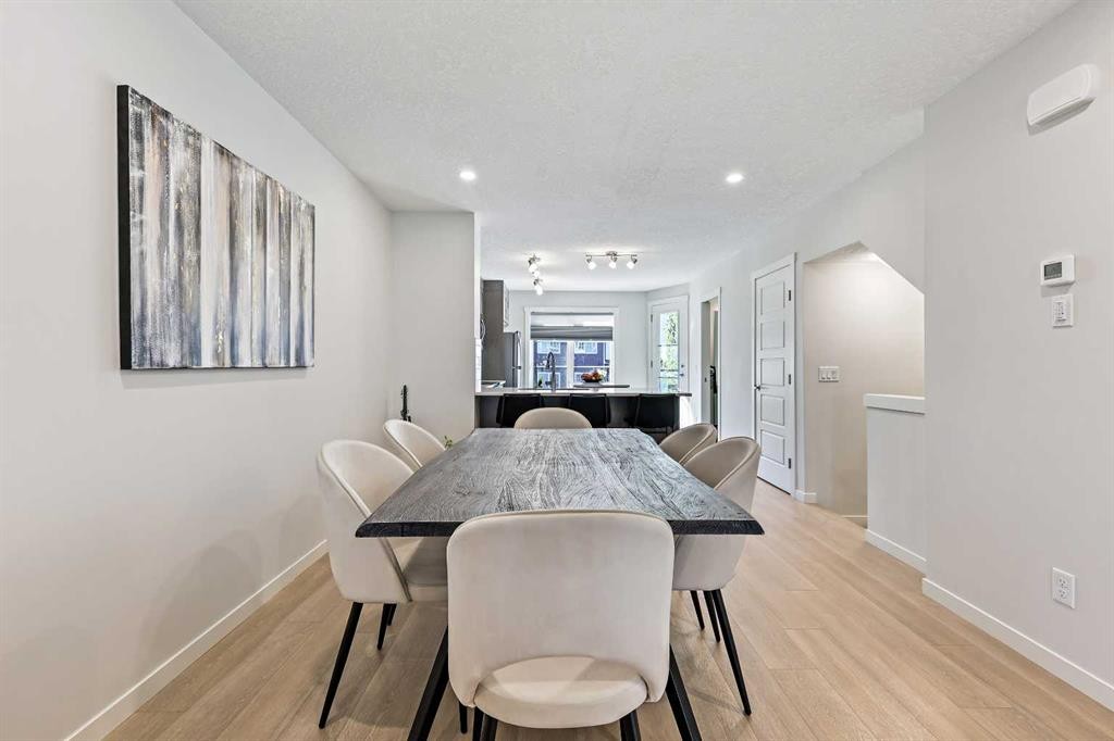 107-474 Seton Circle Se, Calgary, AB - Indoor Photo Showing Dining Room