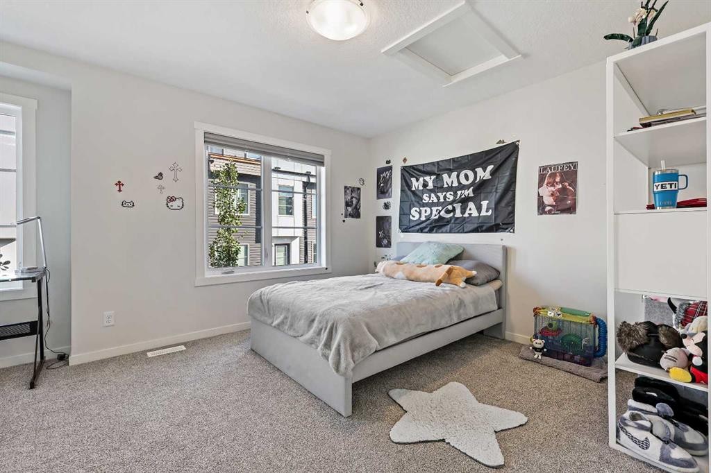 107-474 Seton Circle Se, Calgary, AB - Indoor Photo Showing Bedroom