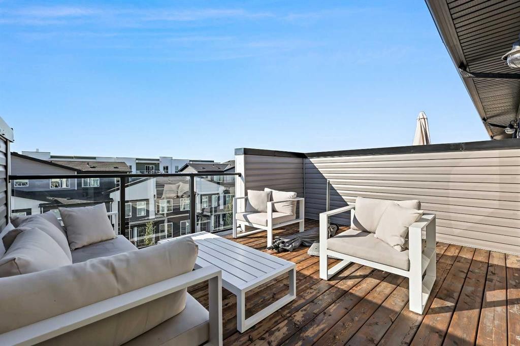 107-474 Seton Circle Se, Calgary, AB - Outdoor With Deck Patio Veranda With Exterior