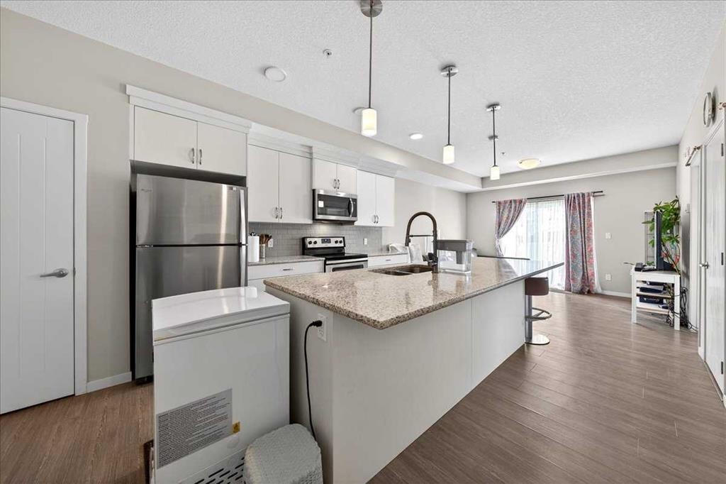 101-20 Seton Park Se, Calgary, AB - Indoor Photo Showing Kitchen With Upgraded Kitchen