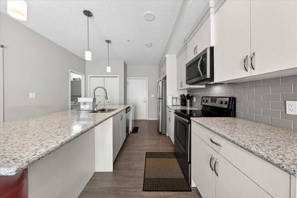 101-20 Seton Park Se, Calgary, AB - Indoor Photo Showing Kitchen With Upgraded Kitchen