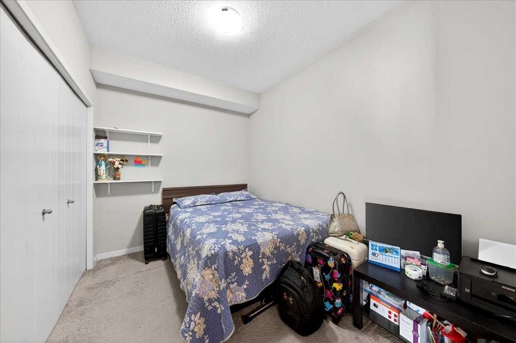 101-20 Seton Park Se, Calgary, AB - Indoor Photo Showing Bedroom