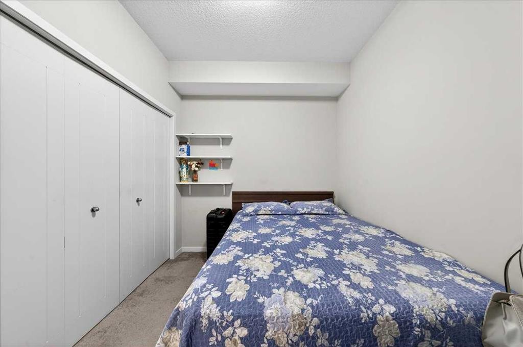 101-20 Seton Park Se, Calgary, AB - Indoor Photo Showing Bedroom