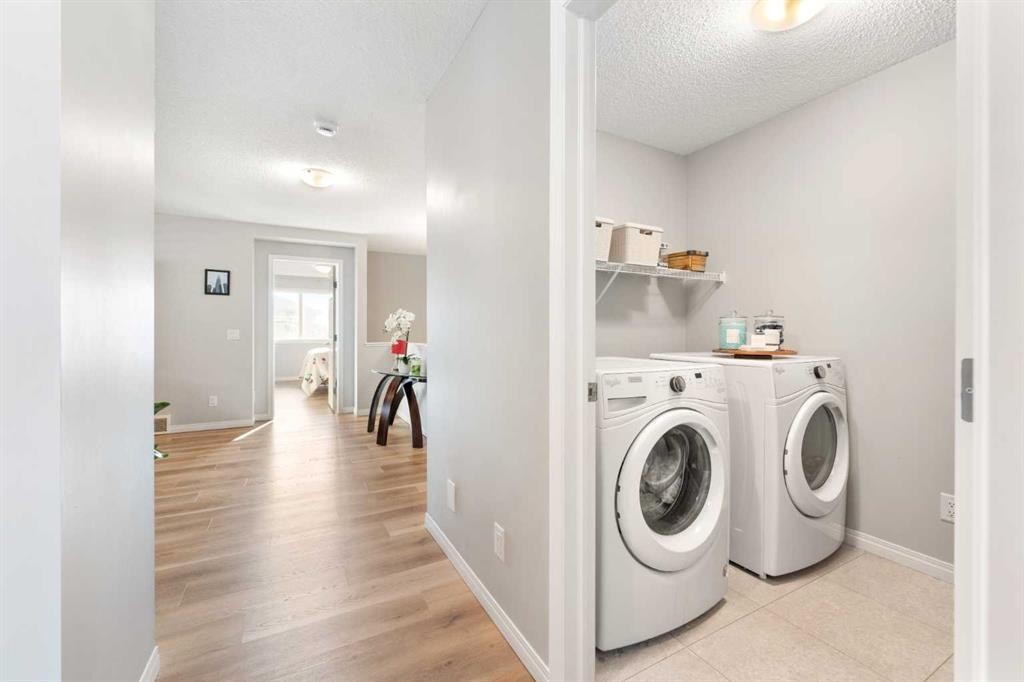 13 Walcrest Way Se, Calgary, AB - Indoor Photo Showing Laundry Room