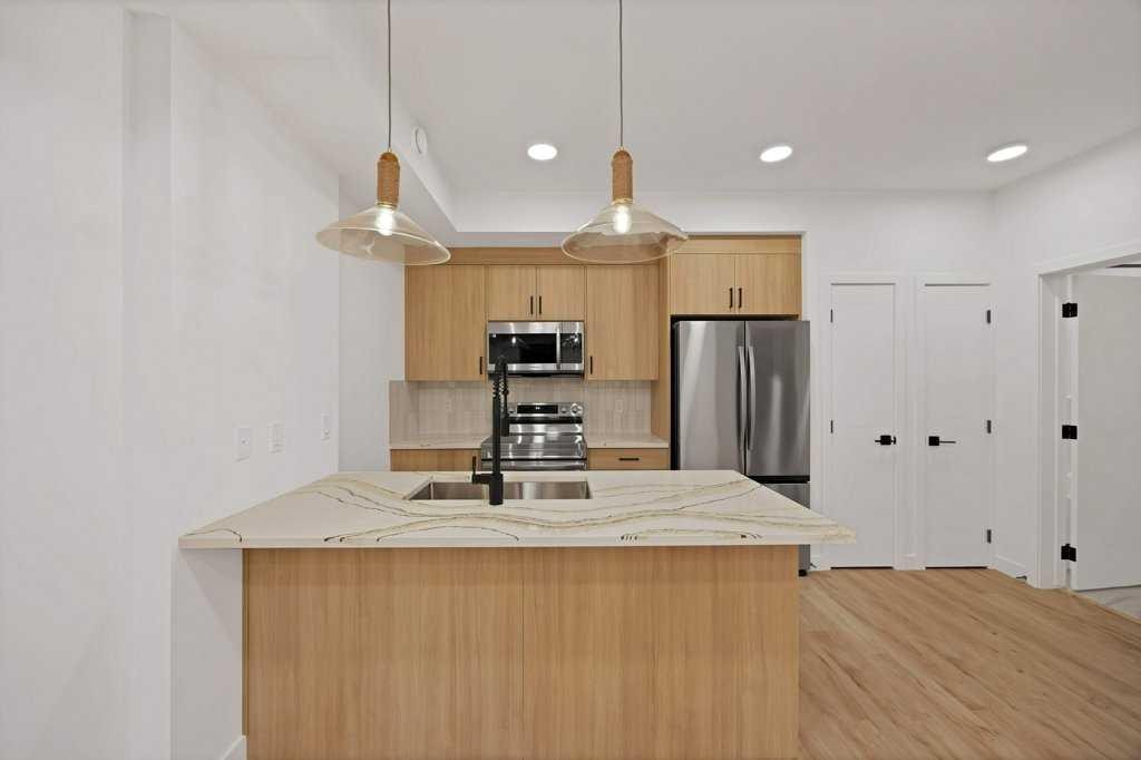 572 Seton Circle, Calgary, AB - Indoor Photo Showing Kitchen With Stainless Steel Kitchen