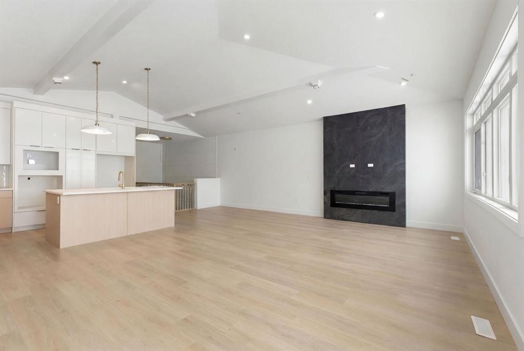 24 St Andrews Close, Lyalta, AB - Indoor Photo Showing Kitchen With Fireplace