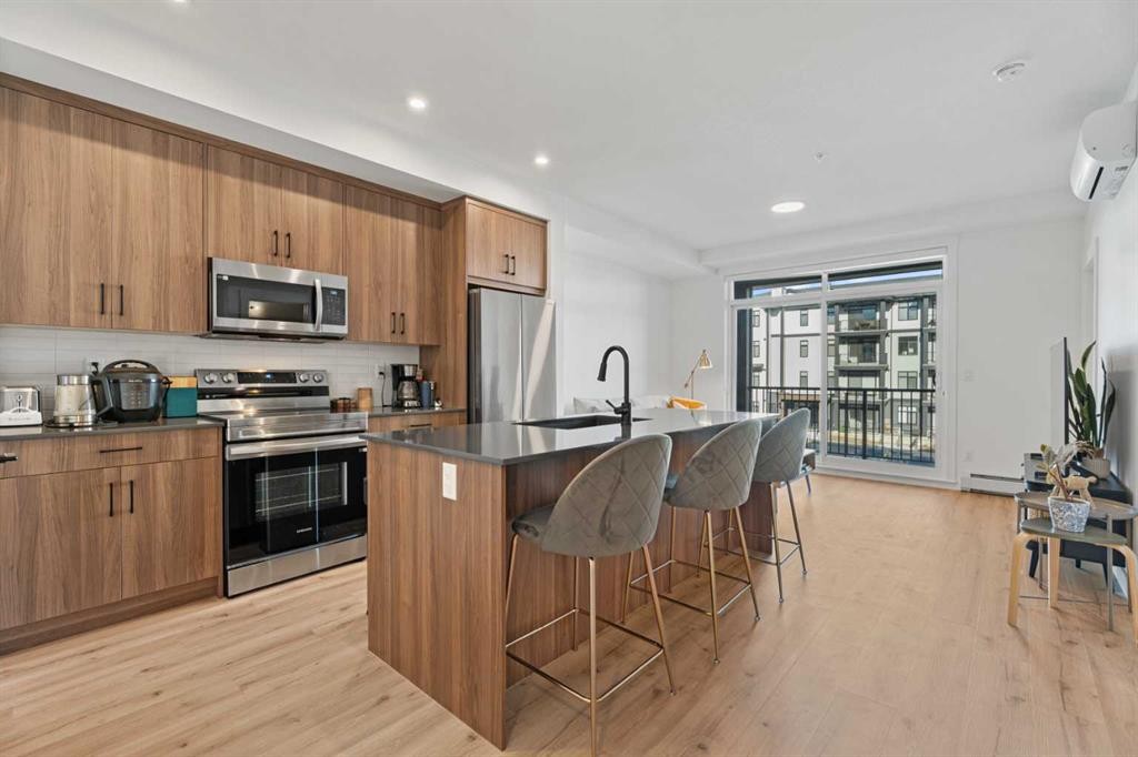 215-70 Sage Hill Walk Nw, Calgary, AB - Indoor Photo Showing Kitchen With Stainless Steel Kitchen With Upgraded Kitchen