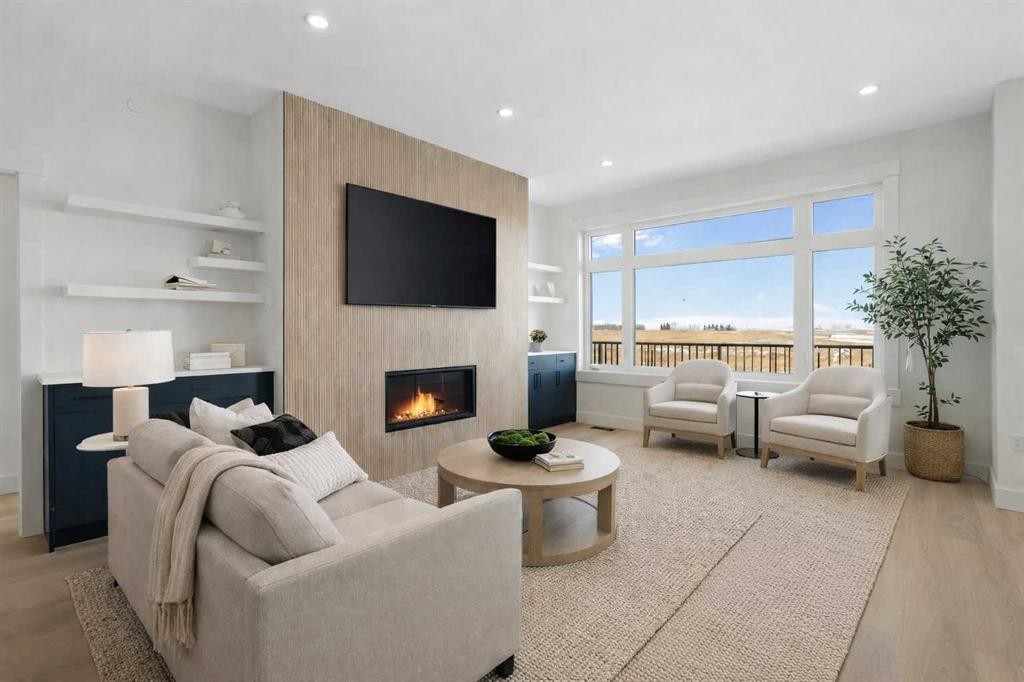 150 Muirfield Boulevard, Lyalta, AB - Indoor Photo Showing Living Room With Fireplace