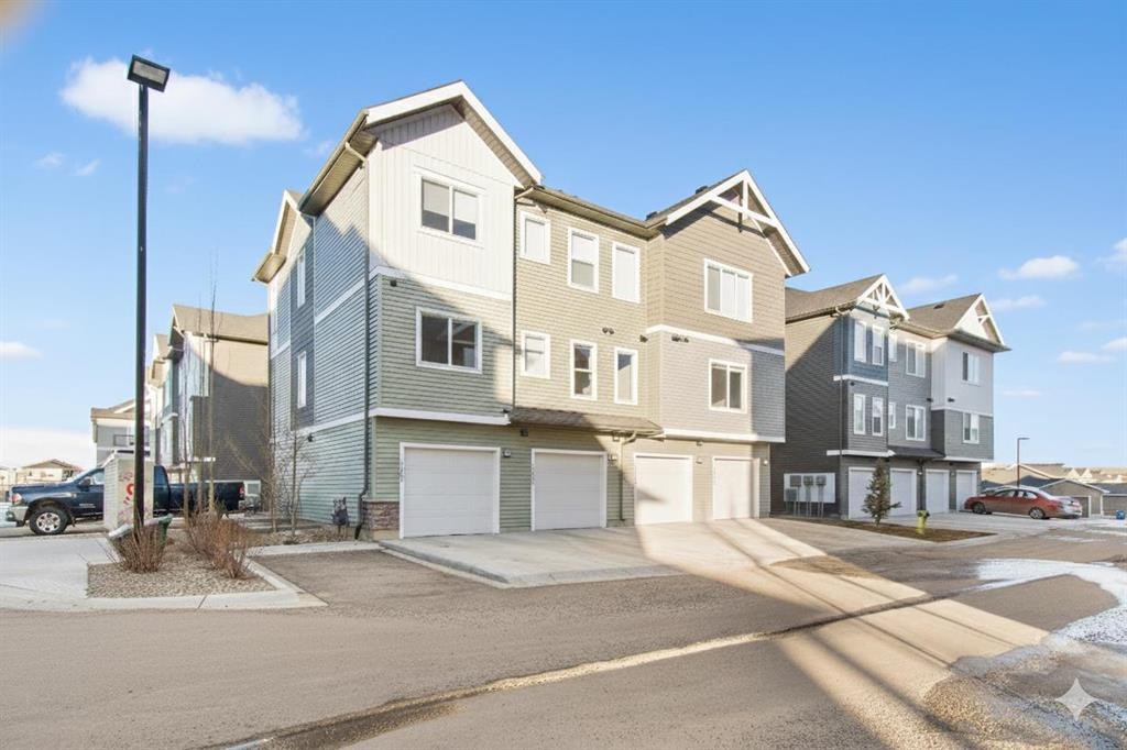 1301-24 Rivercrest Drive, Cochrane, AB - Outdoor With Facade