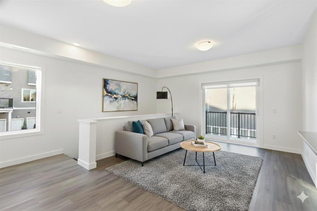 1301-24 Rivercrest Drive, Cochrane, AB - Indoor Photo Showing Living Room