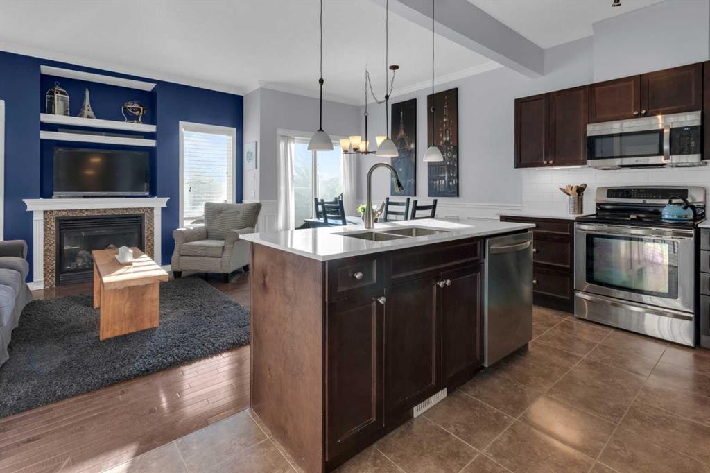 605-620 Luxstone Landing Sw, Airdrie, AB - Indoor Photo Showing Kitchen