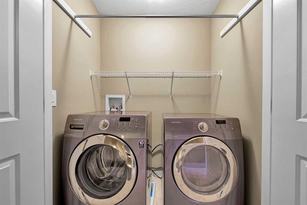 88 Nolanfield Crescent Nw, Calgary, AB - Indoor Photo Showing Laundry Room