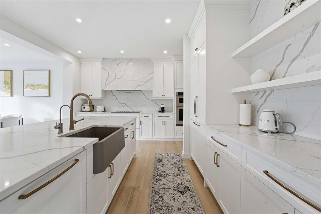 65 Rowmont Link Nw, Calgary, AB - Indoor Photo Showing Kitchen With Upgraded Kitchen