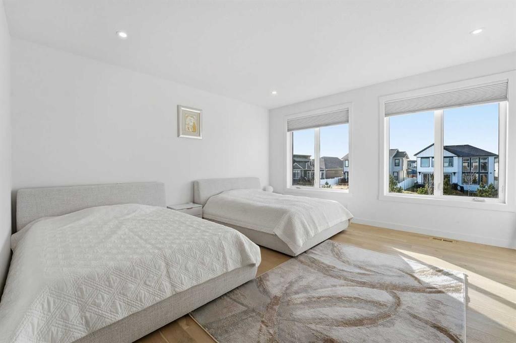 65 Rowmont Link Nw, Calgary, AB - Indoor Photo Showing Bedroom