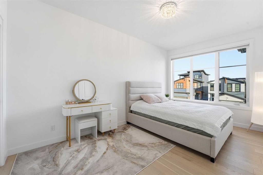 65 Rowmont Link Nw, Calgary, AB - Indoor Photo Showing Bedroom