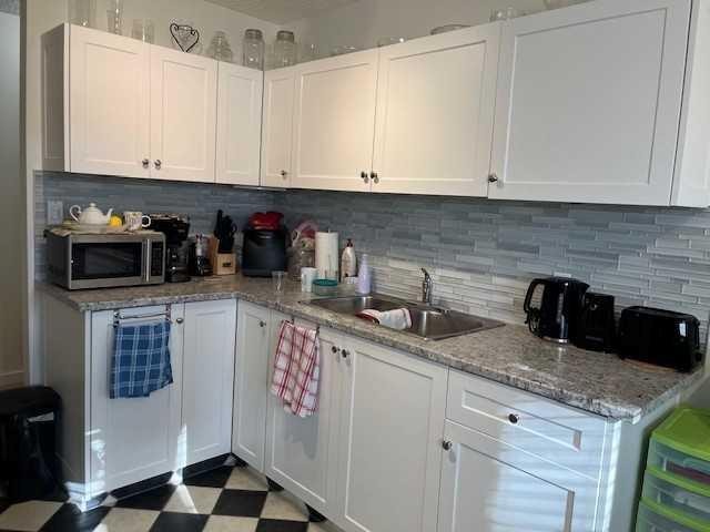 101-4814 46 Street, Red Deer, AB - Indoor Photo Showing Kitchen With Double Sink With Upgraded Kitchen