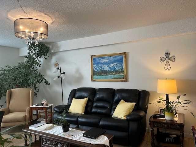 101-4814 46 Street, Red Deer, AB - Indoor Photo Showing Living Room