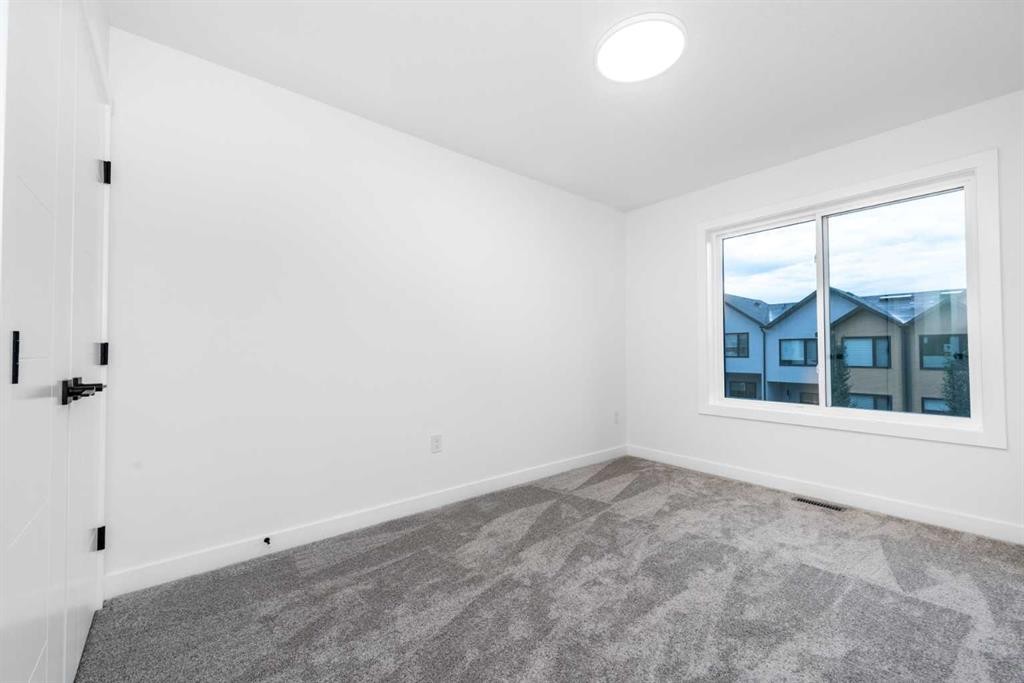 2402 Westmount Road Nw, Calgary, AB - Indoor Photo Showing Other Room