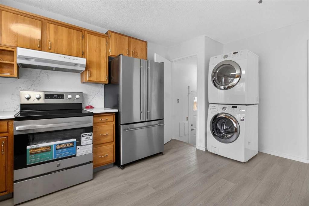 3283 Dover Ridge Drive Se, Calgary, AB - Indoor Photo Showing Laundry Room