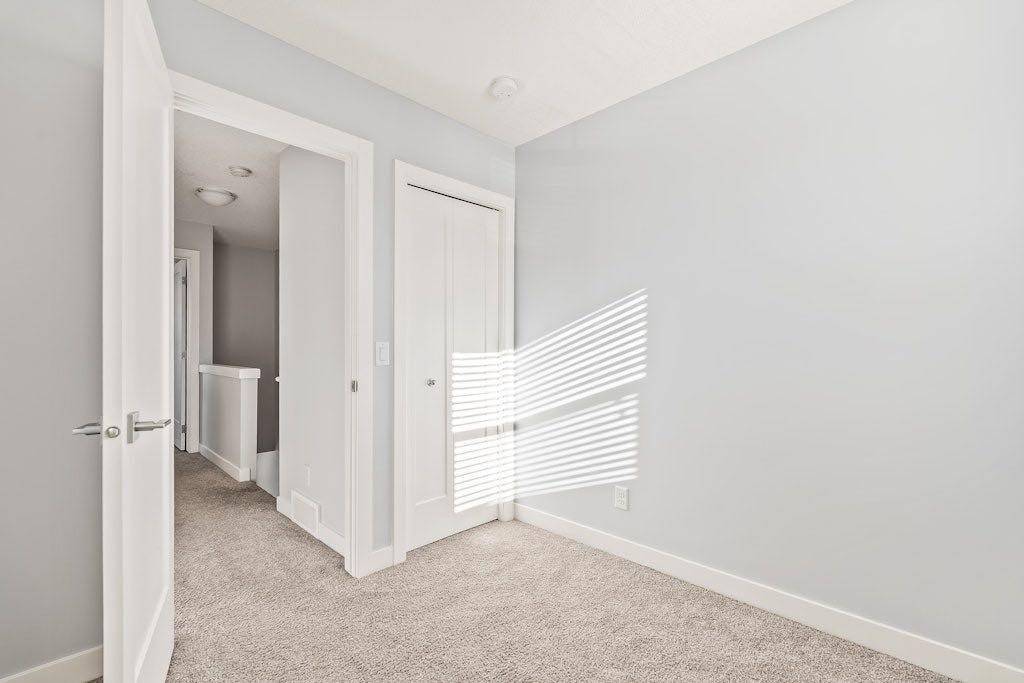 4 Evanscrest Gardens Nw, Calgary, AB - Indoor Photo Showing Other Room