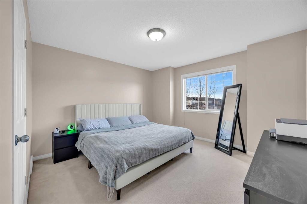 26 Saddlemead Close Ne, Calgary, AB - Indoor Photo Showing Bedroom