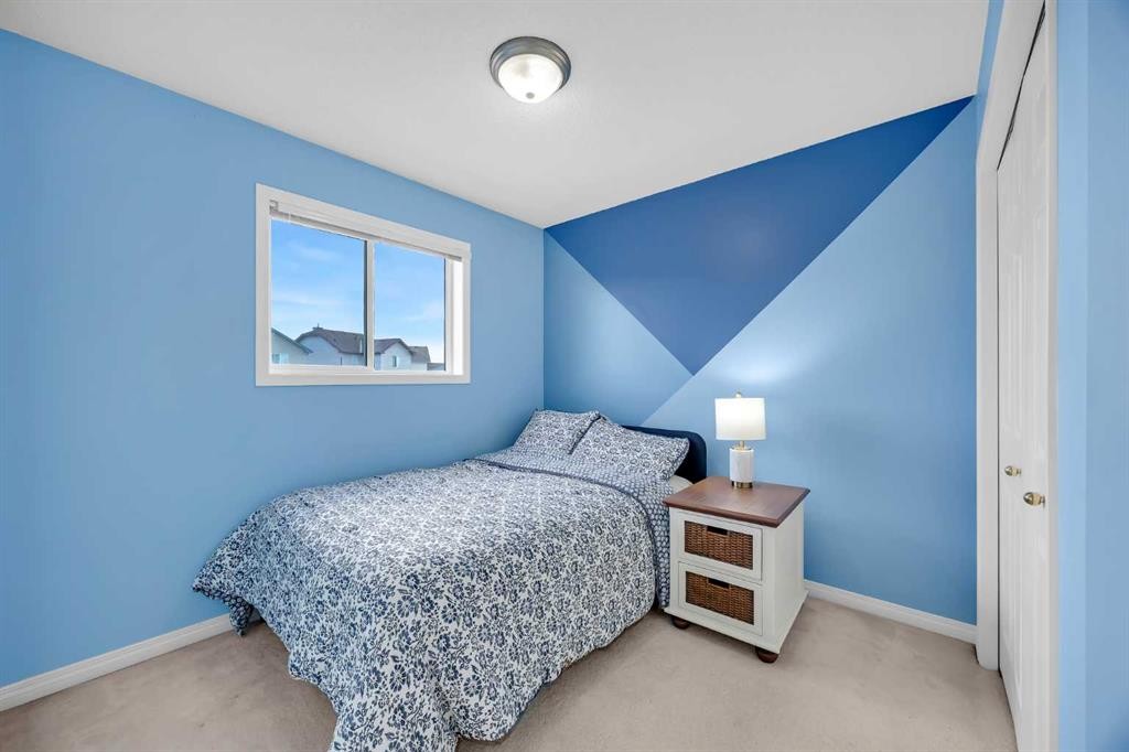 26 Saddlemead Close Ne, Calgary, AB - Indoor Photo Showing Bedroom