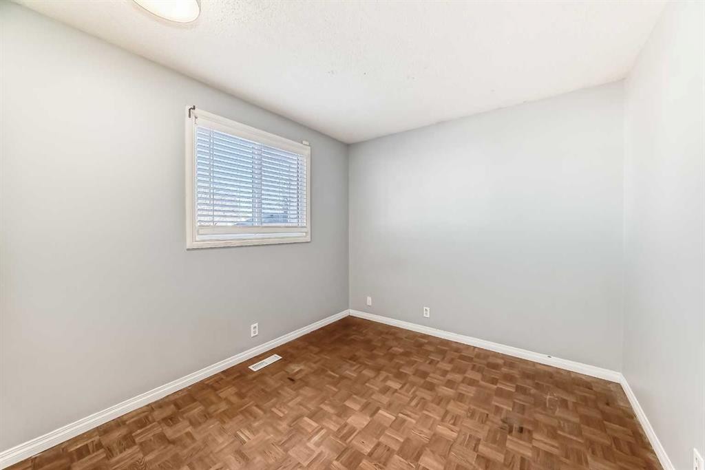 63 Falshire Place Ne, Calgary, AB - Indoor Photo Showing Other Room