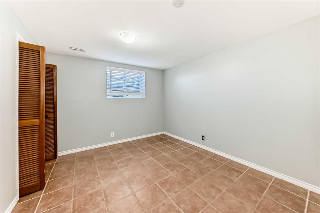 63 Falshire Place Ne, Calgary, AB - Indoor Photo Showing Other Room