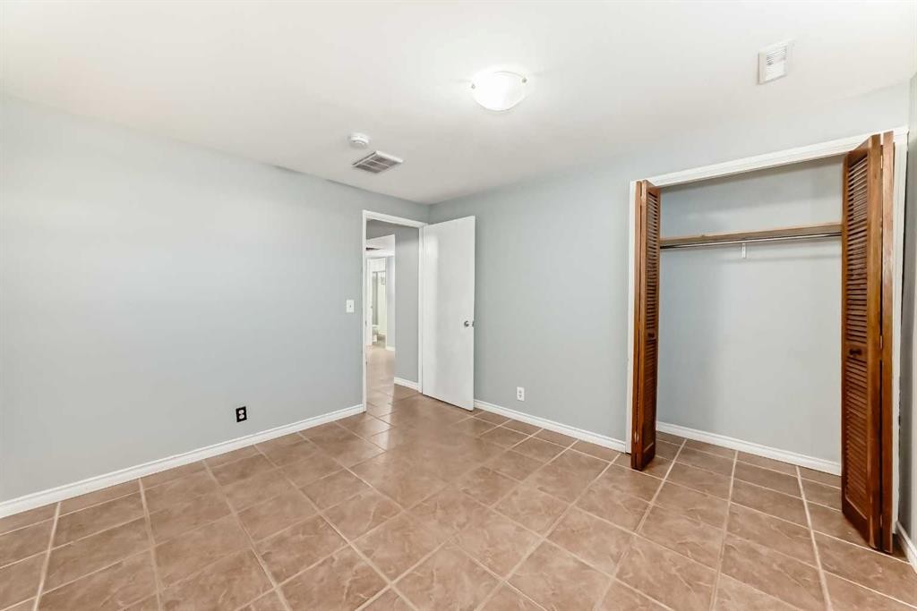 63 Falshire Place Ne, Calgary, AB - Indoor Photo Showing Other Room