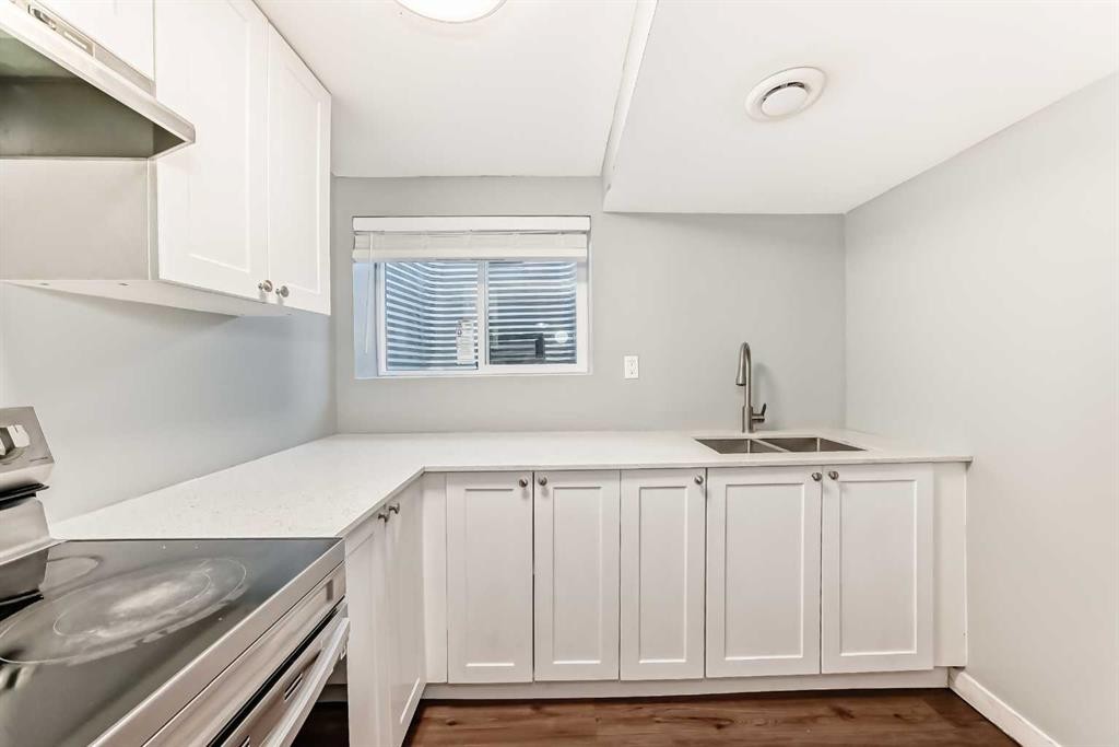 63 Falshire Place Ne, Calgary, AB - Indoor Photo Showing Kitchen With Double Sink