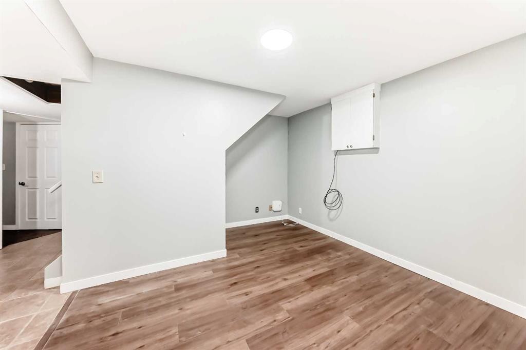 63 Falshire Place Ne, Calgary, AB - Indoor Photo Showing Other Room